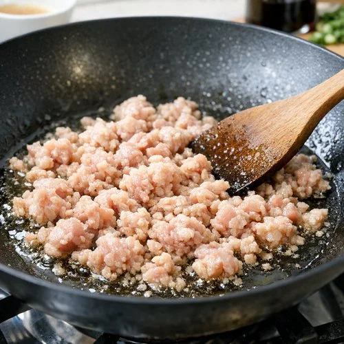 Step 2: Heat Your Oil and Begin Browning the Chicken